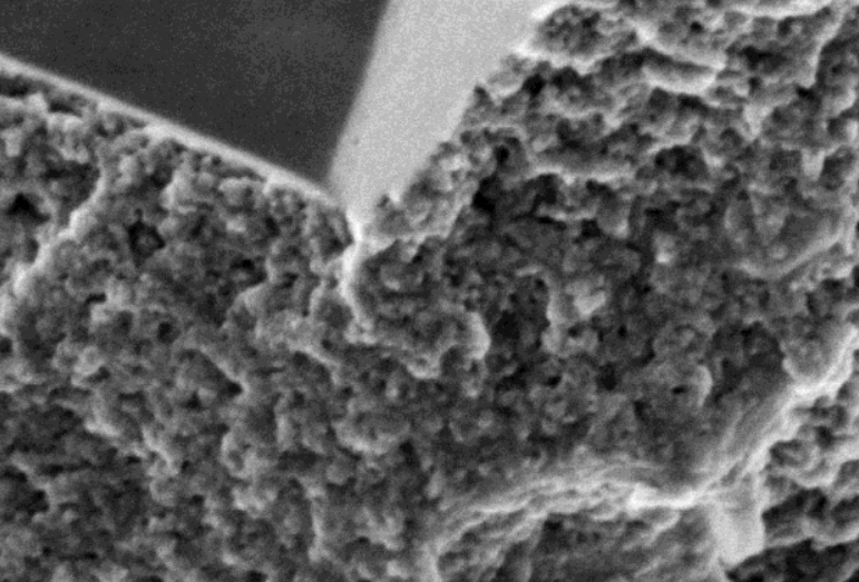 Combining high-resolution with larger volume images for improved characterization of mudstone reservoirs